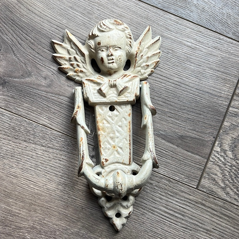 White chippy paint cast iron Cherub door knocker.